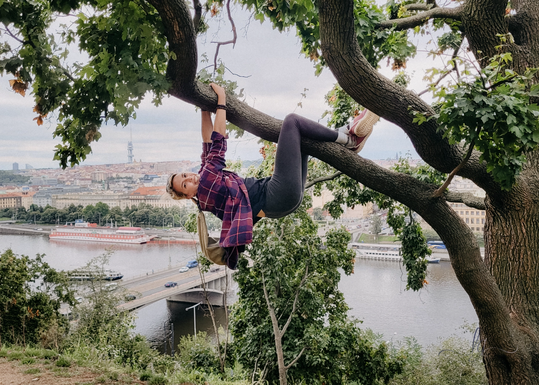 Smiling Lucy is hanging from a tree in Prague.